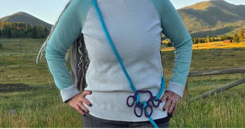 Wearing the Infinity Paw™ crossbody